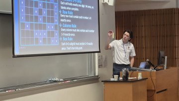 Colin Zouck presents research at CCSCNE 2026